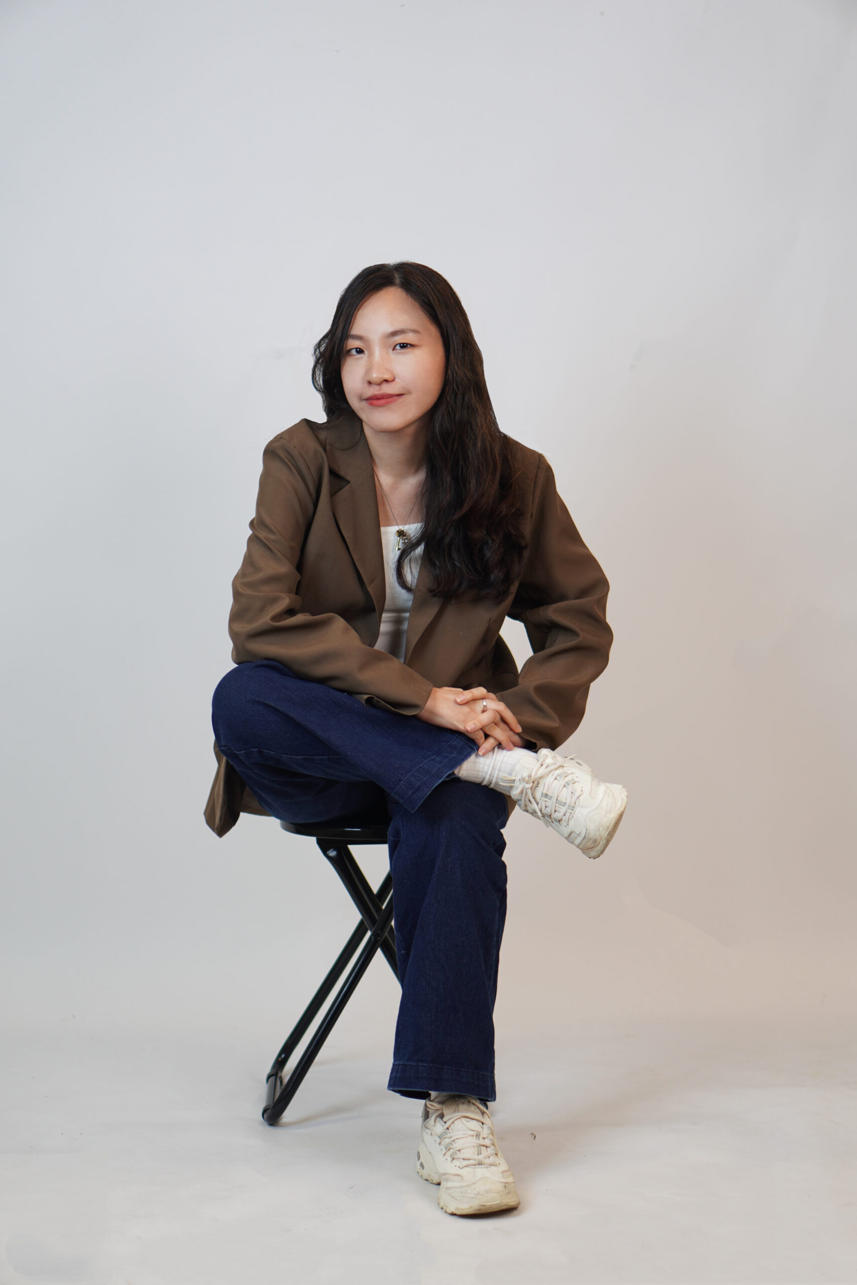 Naomi Chong, the Web and Graphic Designer who founded JHC web design.